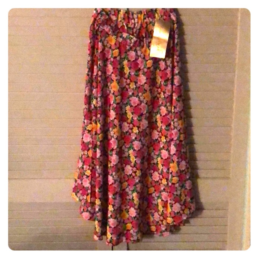 Gottex swimsuit cover.